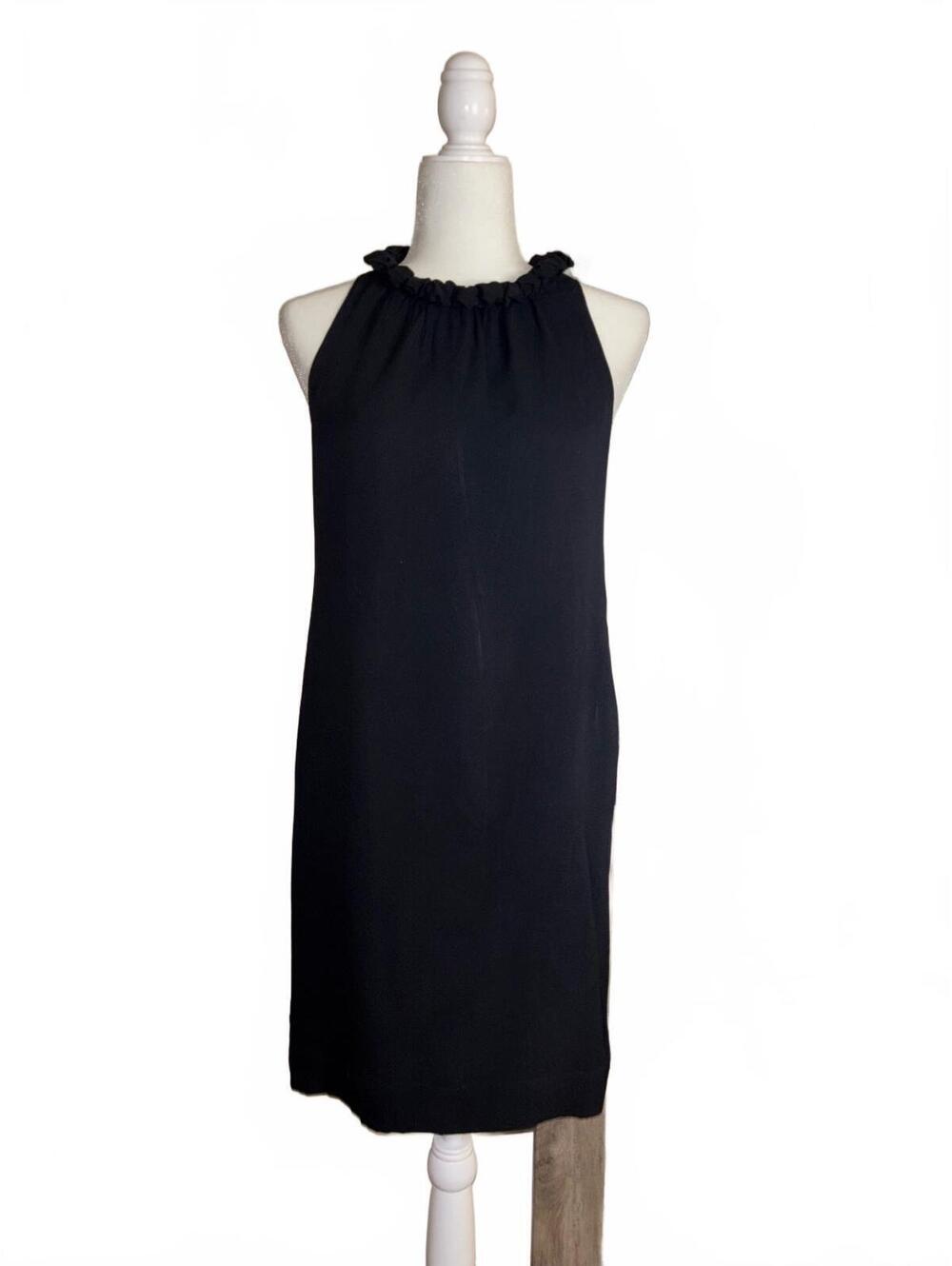 Taylor little black Silk dress with a distinctive ruffle halter neckline